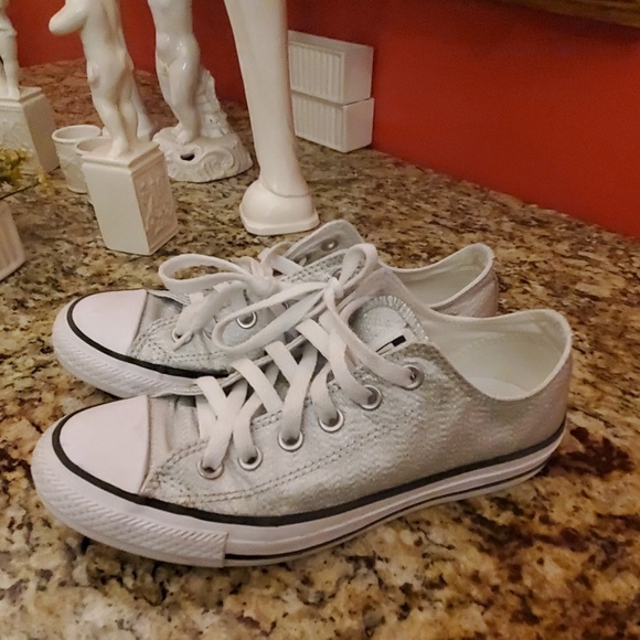silver high top tennis shoes